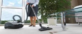 Vacuuming carpet